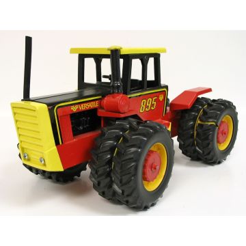 Versatile - 895 - 4WD Duals plastic tires, lg plty, red ax, rbr stk no clr screws - 1/16